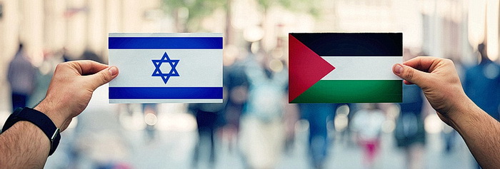 Hands holding Palestine vs Israel flags 
